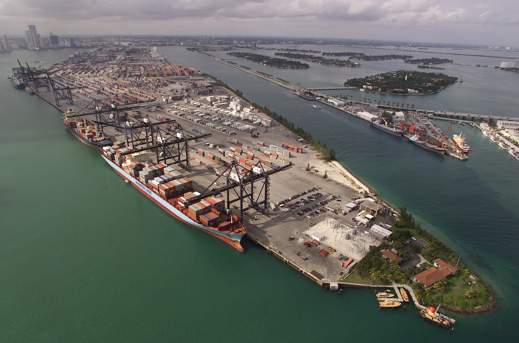 An aerial view of cargo ships, cranes and container terminals at the Port of Miami